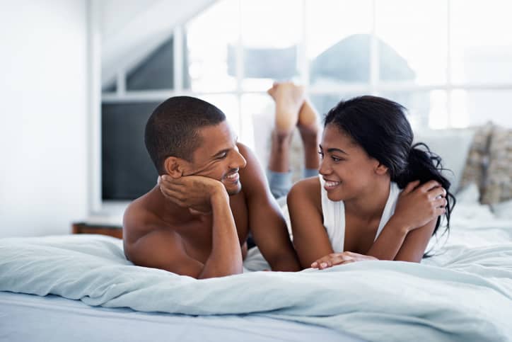 How to have sex like you've never done before - Blog & News Couple talking in bed - How to have sex like you've never done before